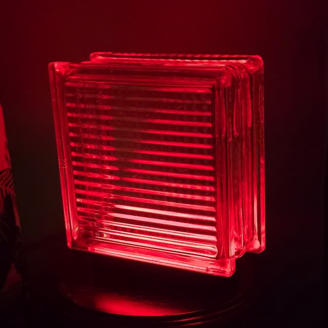 Red lamp glowing in a dark room